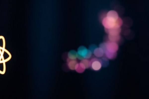 React logo next to a floating Lottie animation